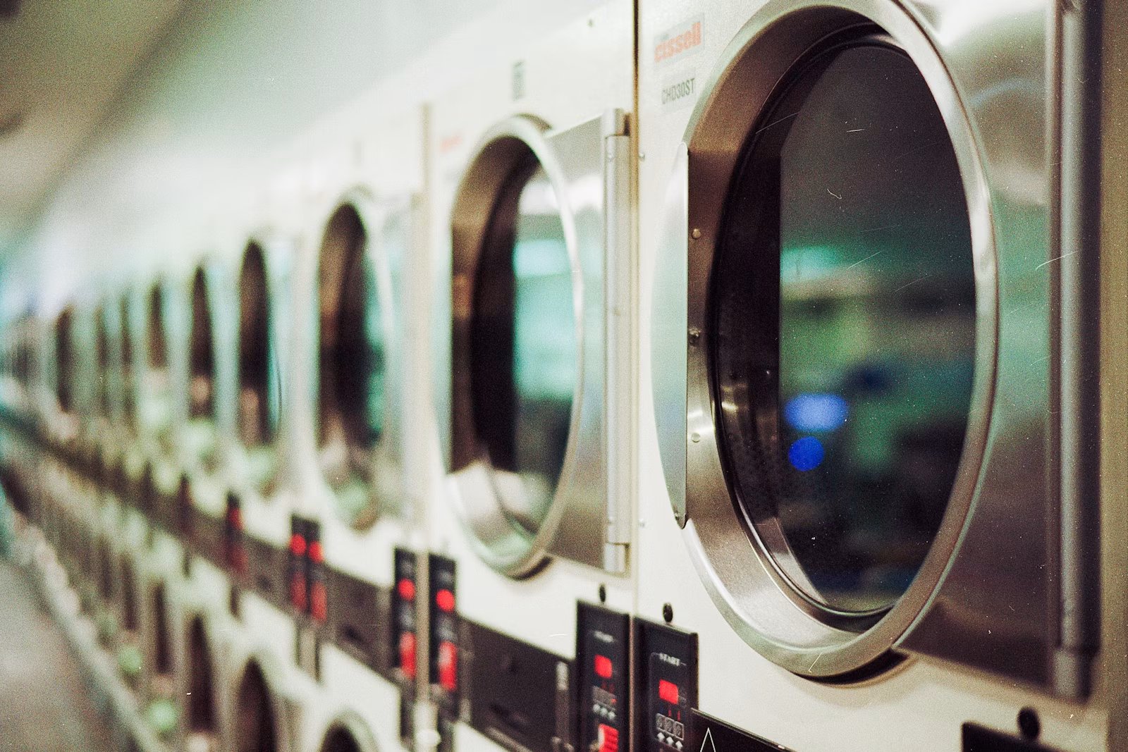 Freshly pressed shirts hanging in a premium laundry facility